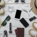 Top view women and man for essentials to travel accessories