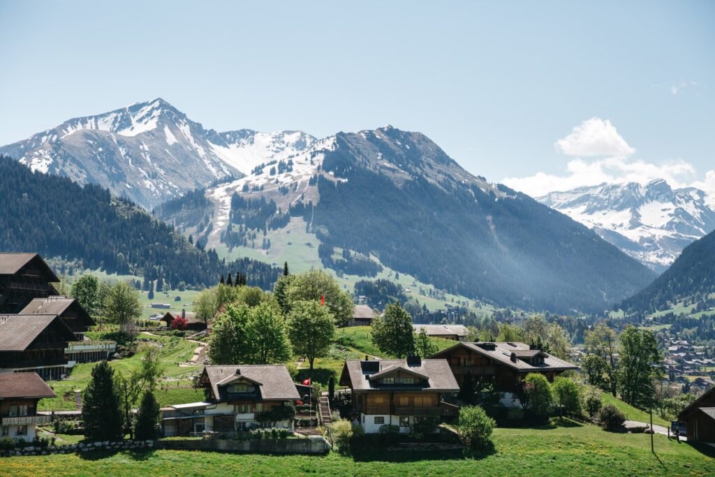 Swiss Alps and Zurich skyline, highlighting Switzerland’s streamlined Schengen visa process and tourism-friendly approval rates.